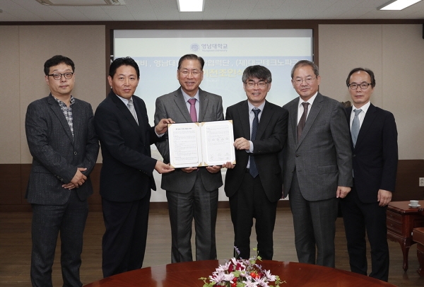 왼쪽부터 영남대 이희용 기술이전사업화센터장, ㈜티엠비 윤재만 대표, 영남대 서길수 총장, 곽진석 물리학과 교수, (재)대구테크노파크 권업 원장, 배선학 기업지원단장